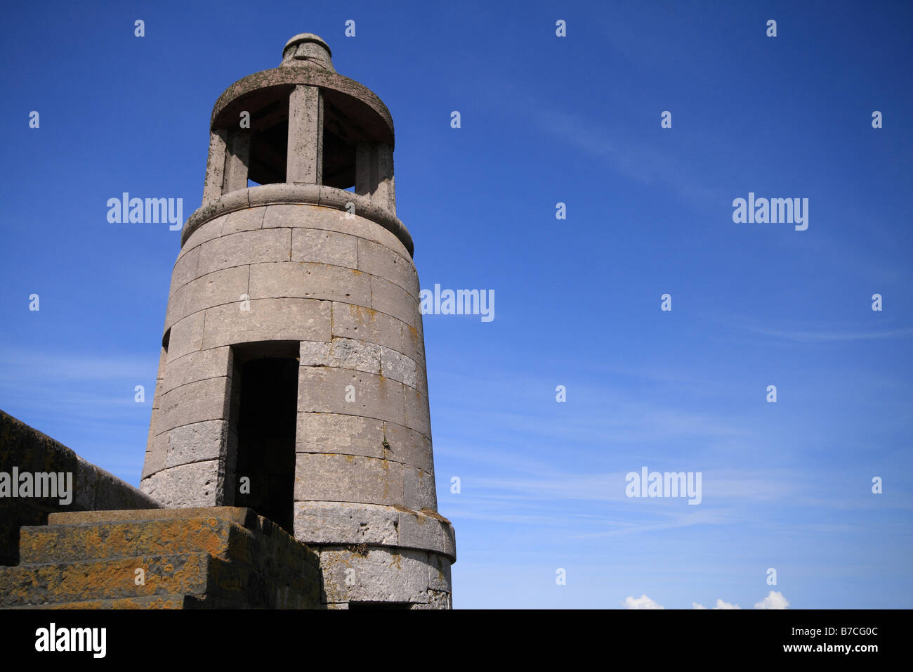 Harbour Wall and Lighthouse at Port Logan, Mull of Galloway, South Western Scotland Stock Photo