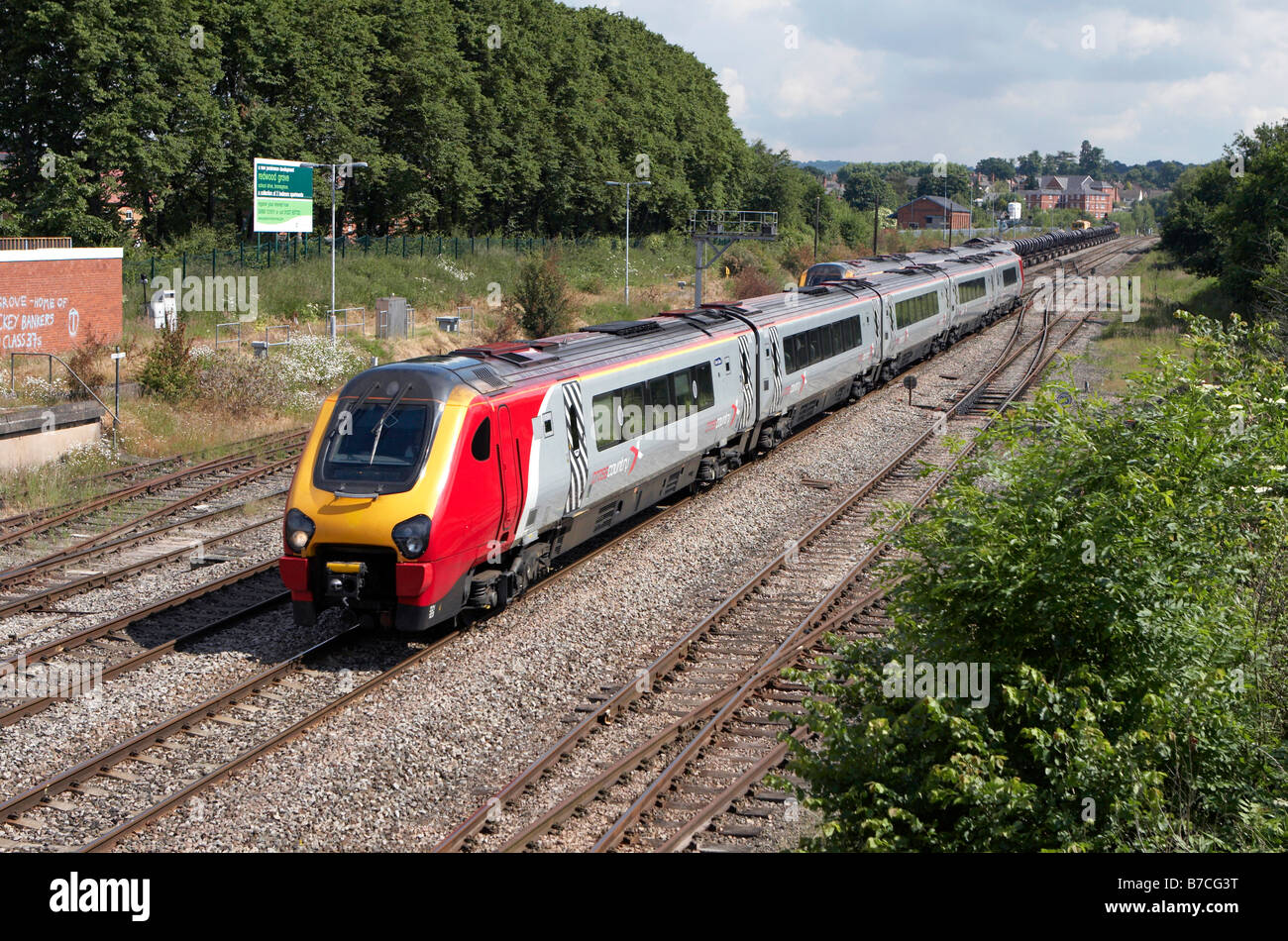 Voyager 221 123 heads south at Bromsgrove and the site of the soon to ...