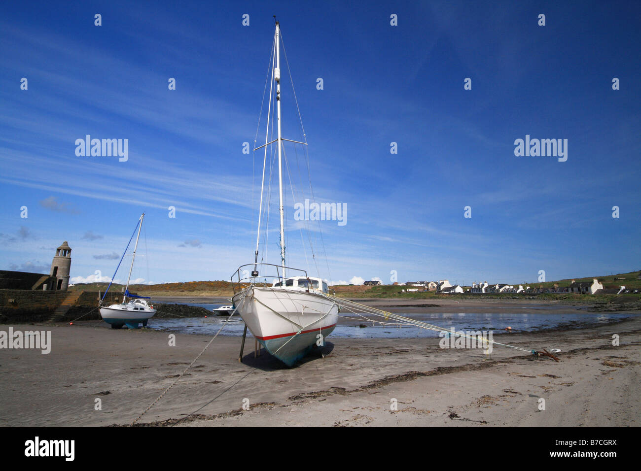 Sailing Boat in Port Logan Harbour, Mull of Galloway, South Western Scotland Stock Photo