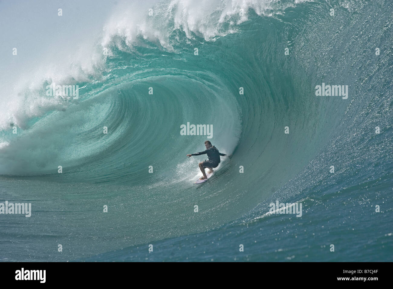 Carlos Burle surfing at Teahupoo Tahiti Stock Photo