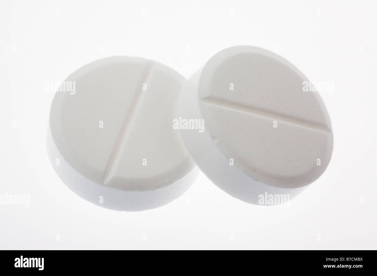 two paracetamol tablets isolated on white background Stock Photo