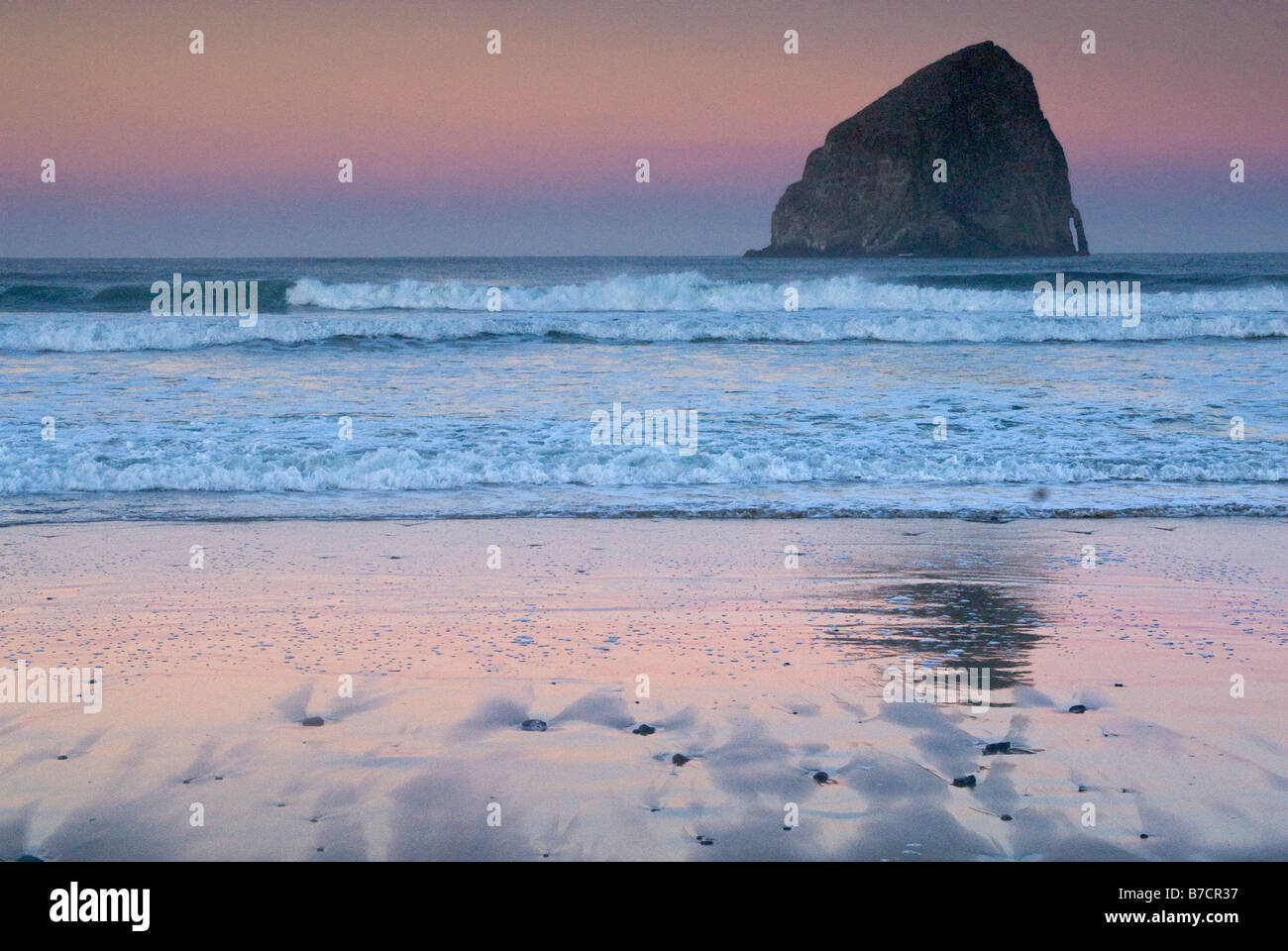 Haystock Rock at Three Capes Scenic Route at dawn near Oceanside Oregon USA Stock Photo
