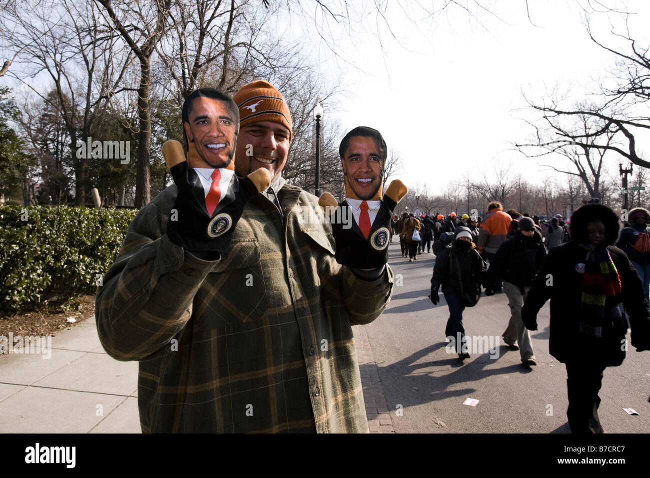 An man with Obama hand puppets Stock Photo