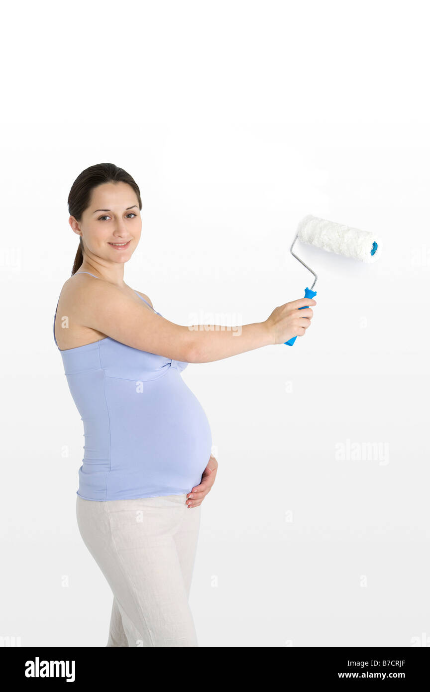 Pregnancy pregnant smile paint hires stock photography and images Alamy
