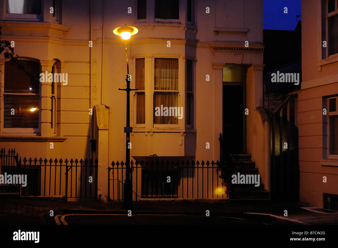 House and Street lamp at night Brighton UK Stock Photo