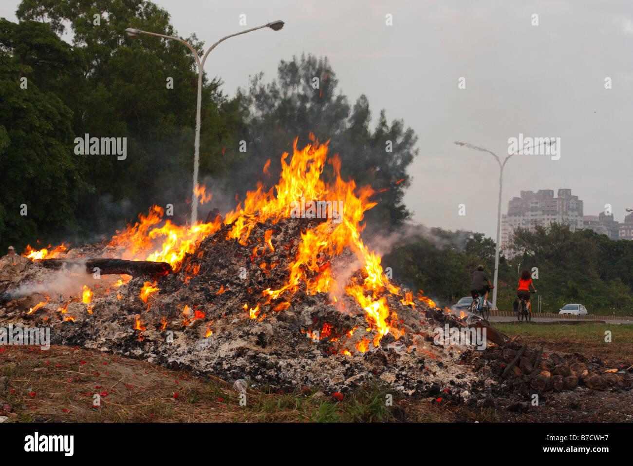 A trash fire burning. Stock Photo