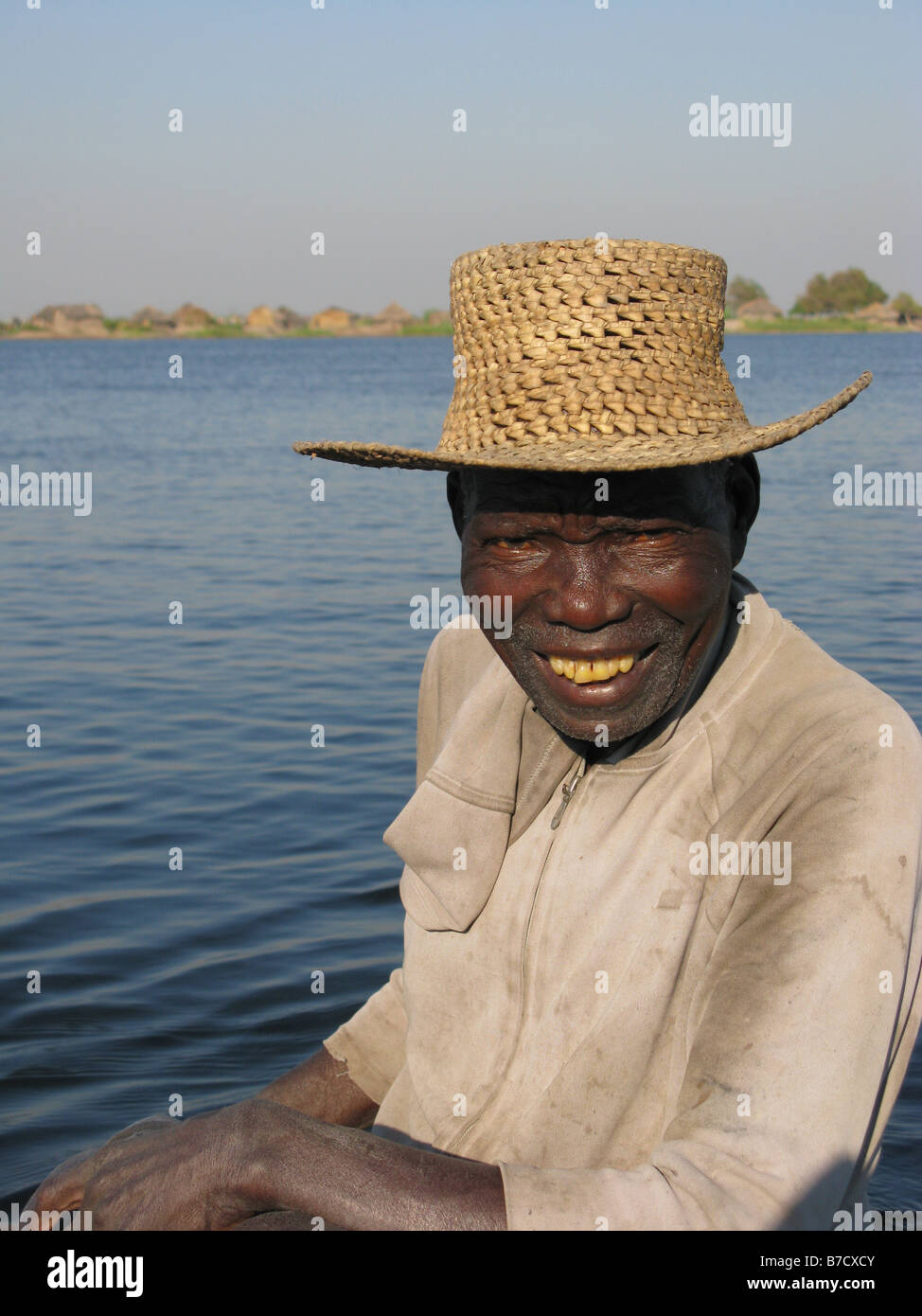Fisherman wearing straw hat hi res stock photography and images
