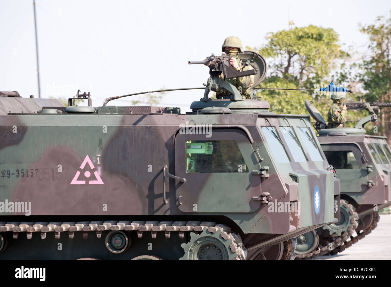 Close up Of A Taiwanese Soldier Firing A M2 Machine Gun On A CM-24 Armored Carrier During War Games, Taichung, Taiwan Stock Photo