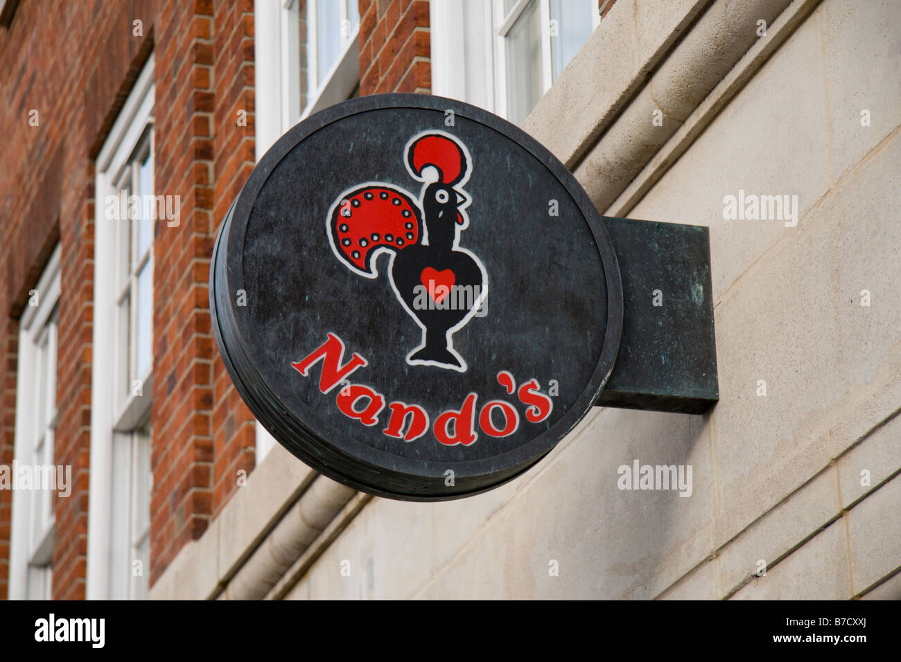 Nando's sign and logo above the restaurant in Oxford, England.  Jan 09 Stock Photo