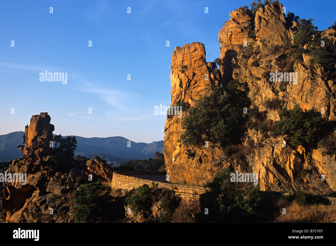 Rocky Outcrops Lit By Evening Light in the Calanches of Piana, a natural World Heritage Site, Corsica, France Stock Photo