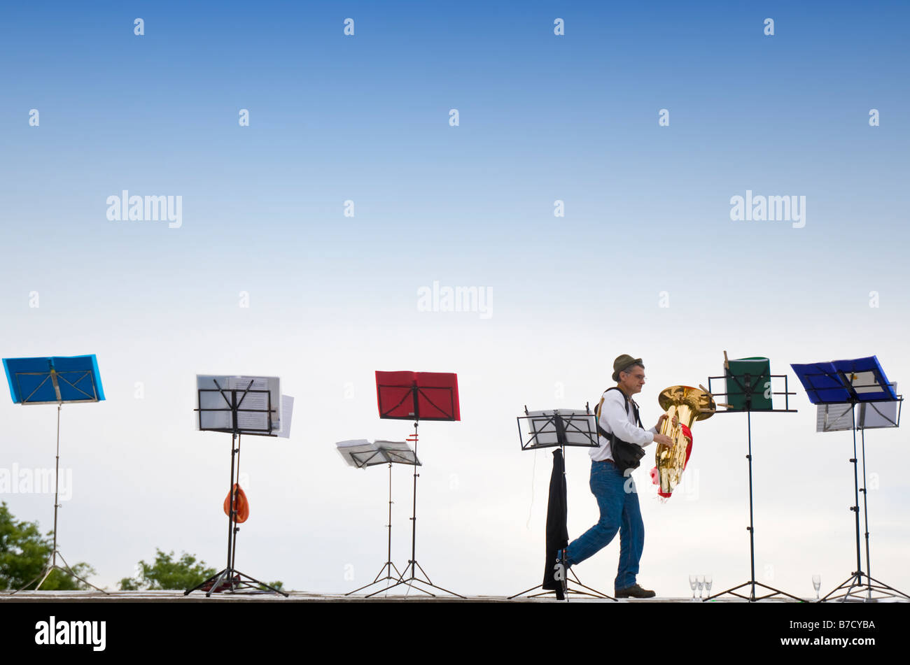 Music stands with a trumpet player Stock Photo Alamy