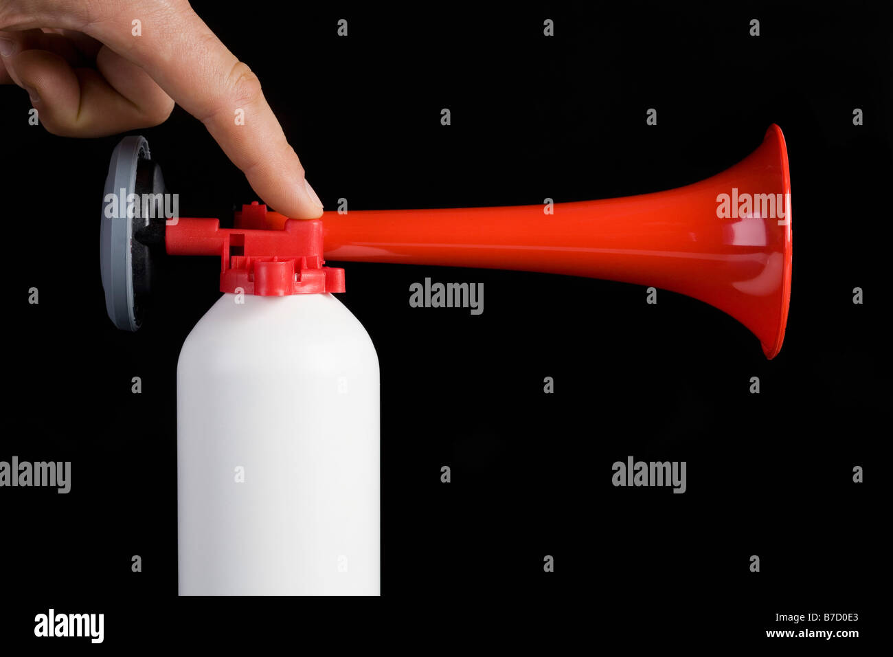 A human finger using an air horn Stock Photo Alamy