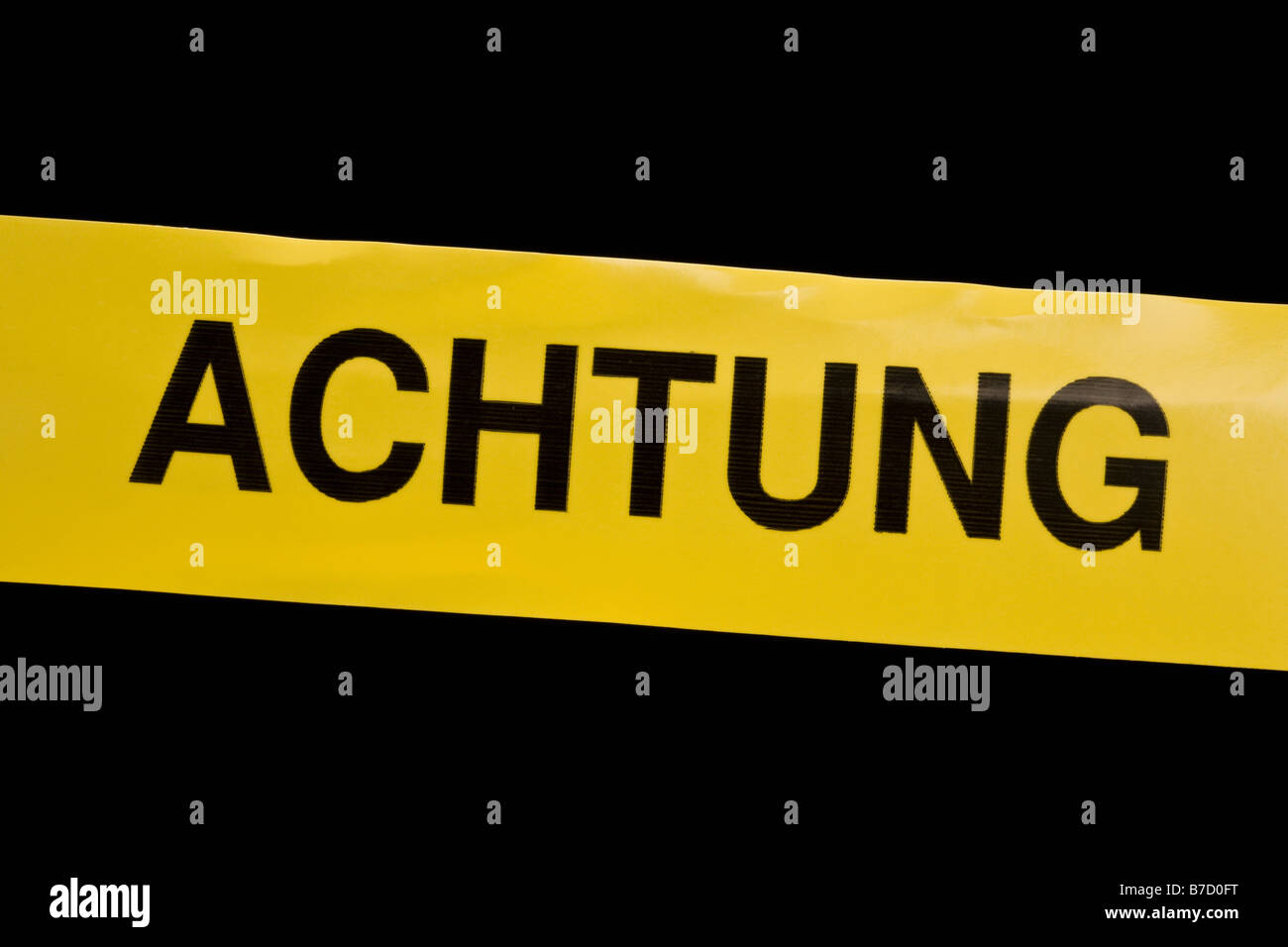 Cordon tape with ACHTUNG on it Stock Photo