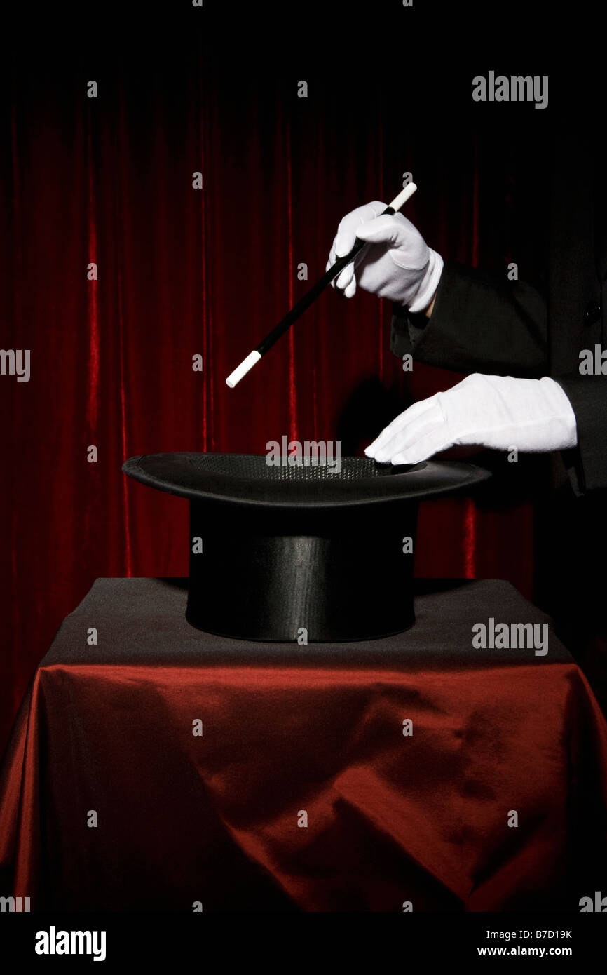 A magician's gloved hands performing a magic trick Stock Photo Alamy