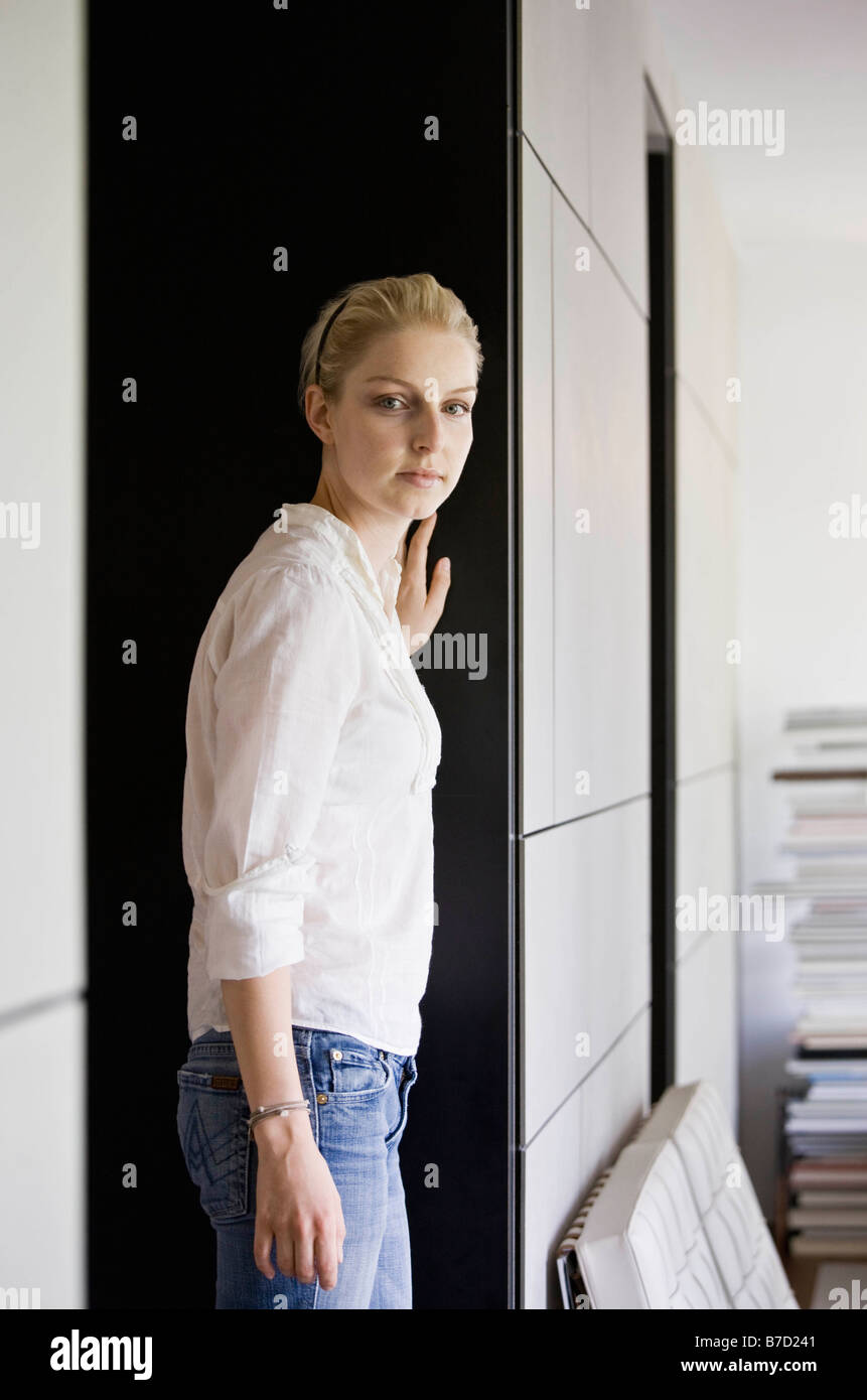 Portrait of a woman in a living room Stock Photo - Alamy