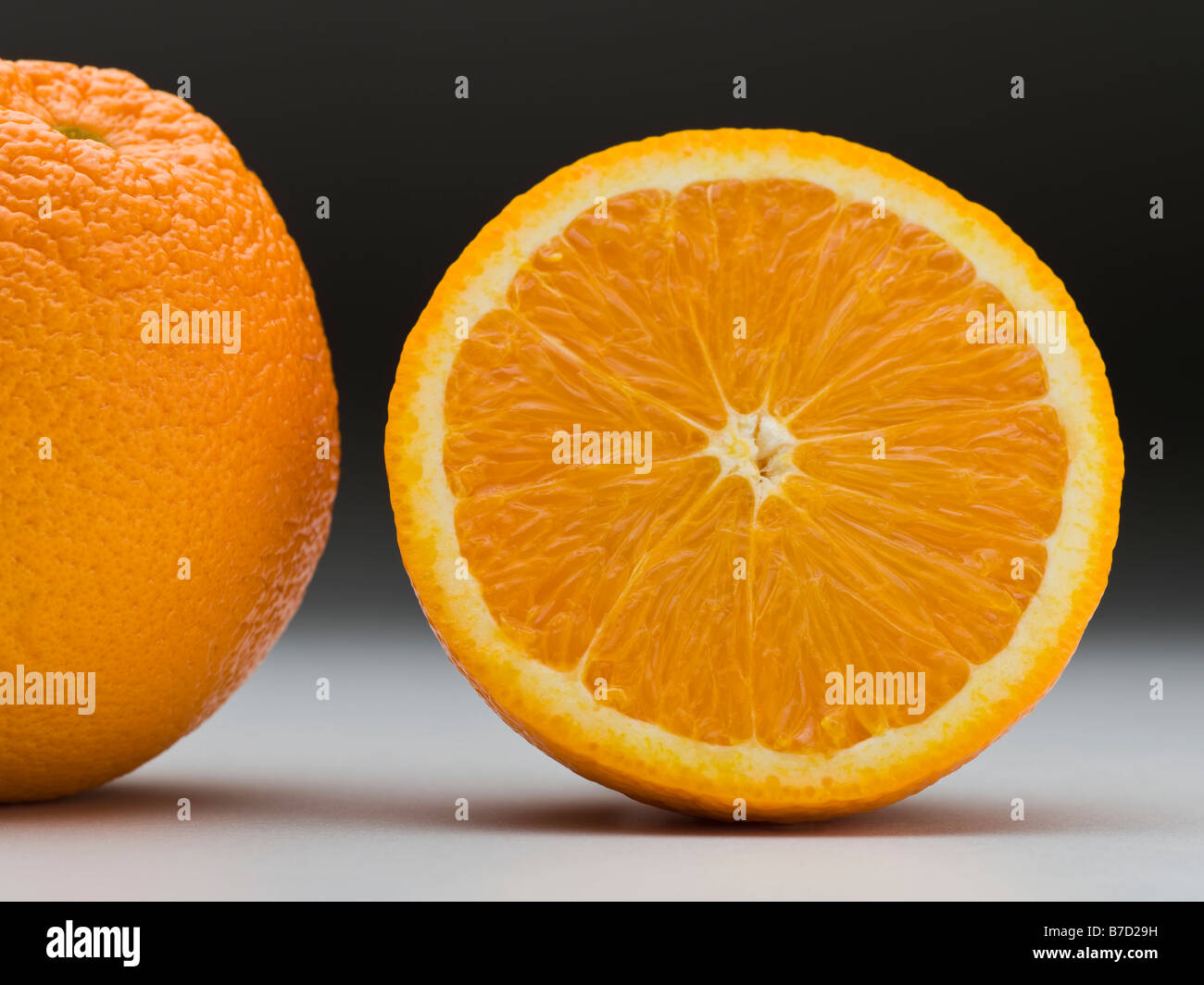 Two half orange hi-res stock photography and images - Alamy