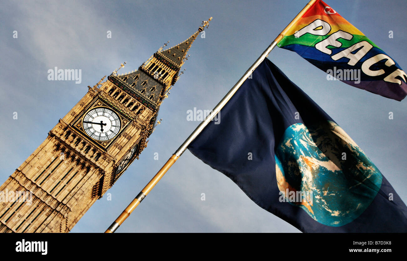 A 'peace' flag flying outside the Houses of Parliament, London, with Big Ben in the background. Stock Photo