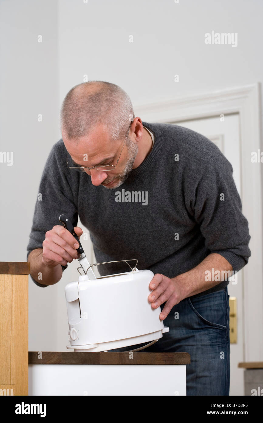 Sticking in the knife hires stock photography and images Alamy