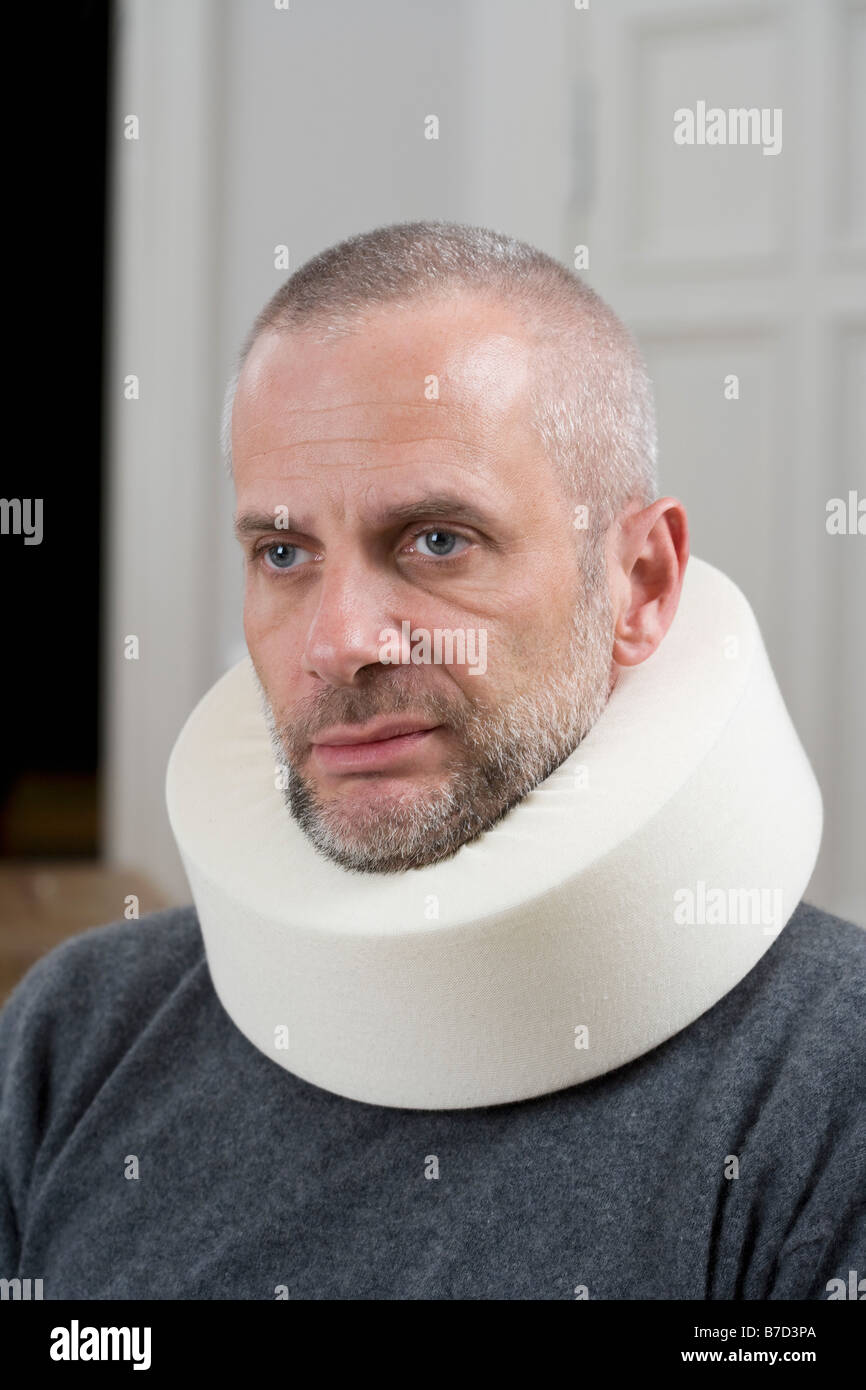 A man wearing a neck brace Stock Photo Alamy
