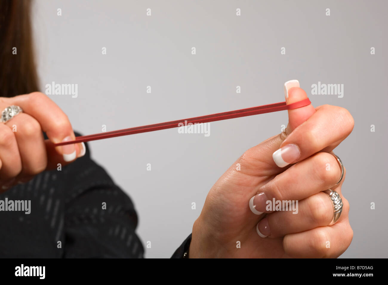 Flicking rubber band hires stock photography and images Alamy