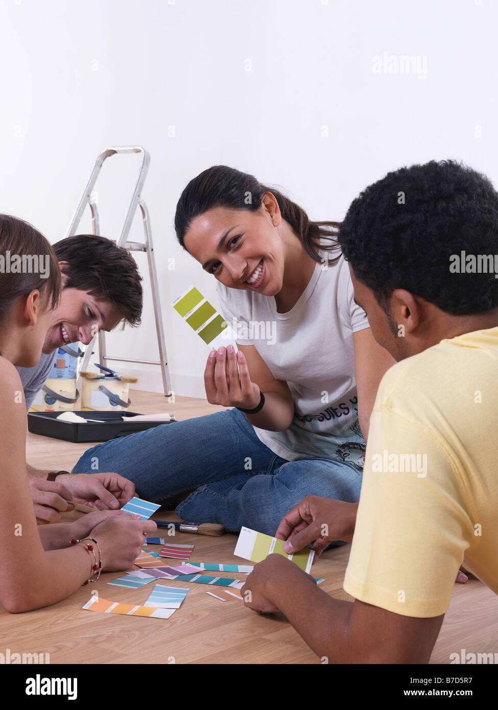 Group of friends choosing paint colours Stock Photo Alamy
