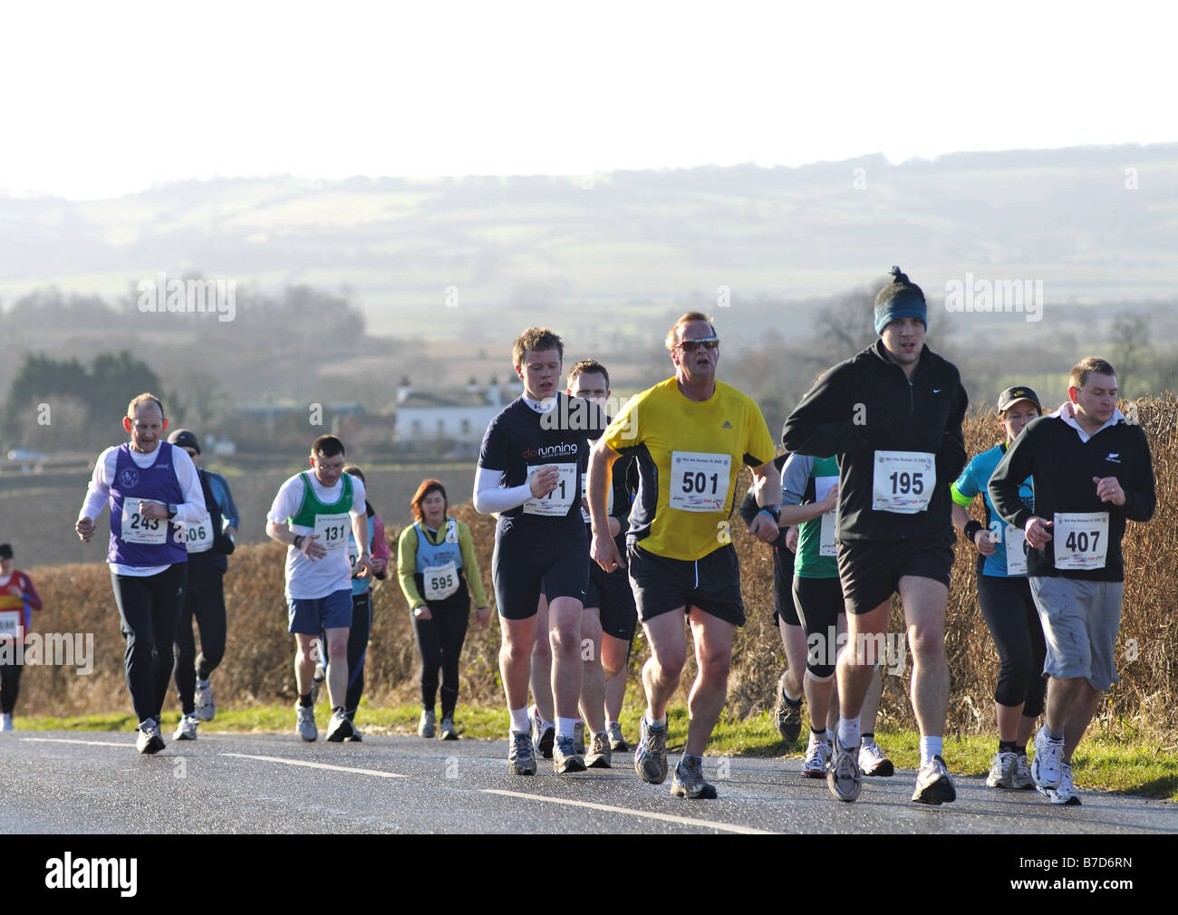 Running in a race hires stock photography and images Alamy