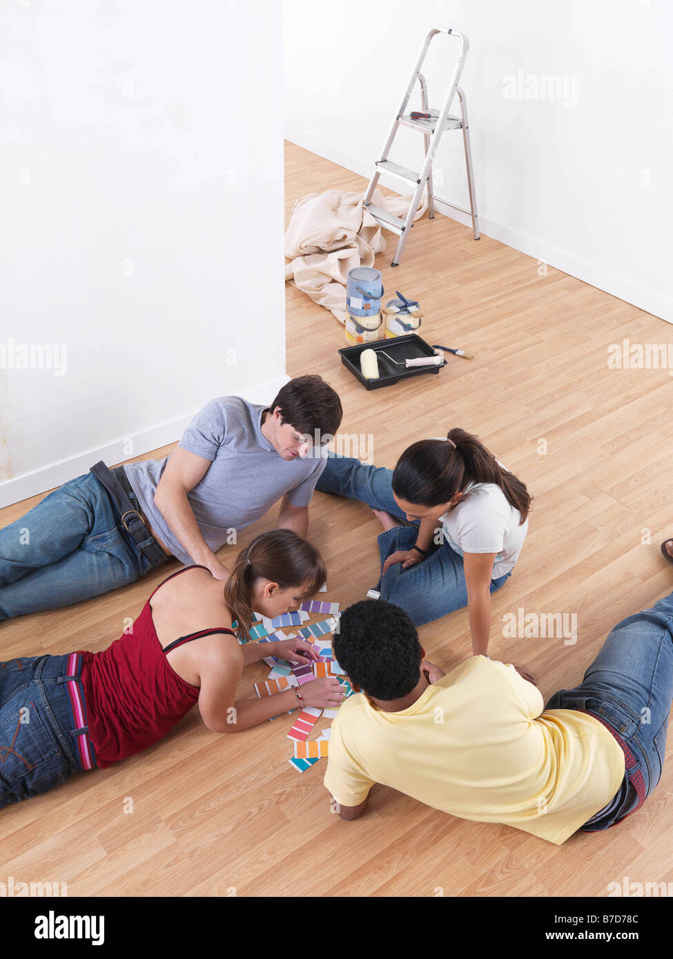Group of friends choosing paint colours Stock Photo Alamy