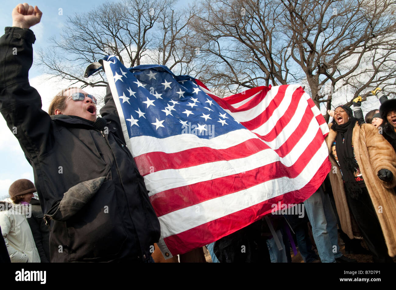 Daniel Saucedo of San Francisco and Yvette Jarvis of Athens, Greece, celebrate the Obama inauguration on the National Mall. Stock Photo