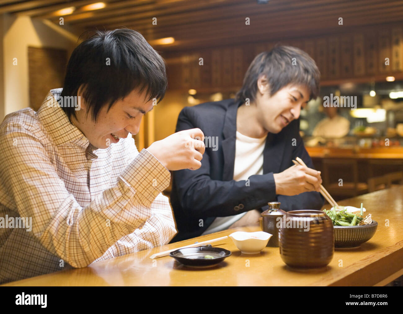 Two Men Sitting in a Pub Stock Photo