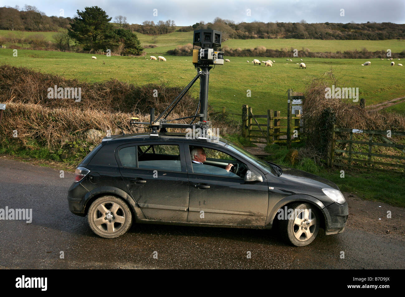 A car travelling the roads in Devon, taking pictures for future use on virtual street mapping websites or sat nav Stock Photo