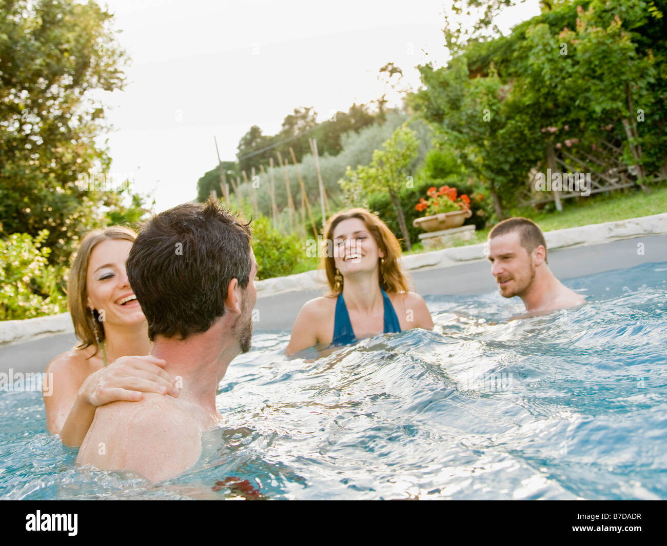Middle Friends Pool Group of friends in pool Stock Photo - Alamy
