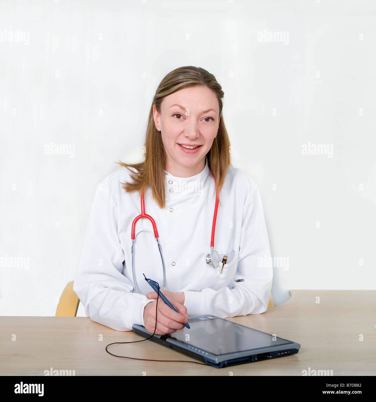 Female doctor using tablet pc Stock Photo