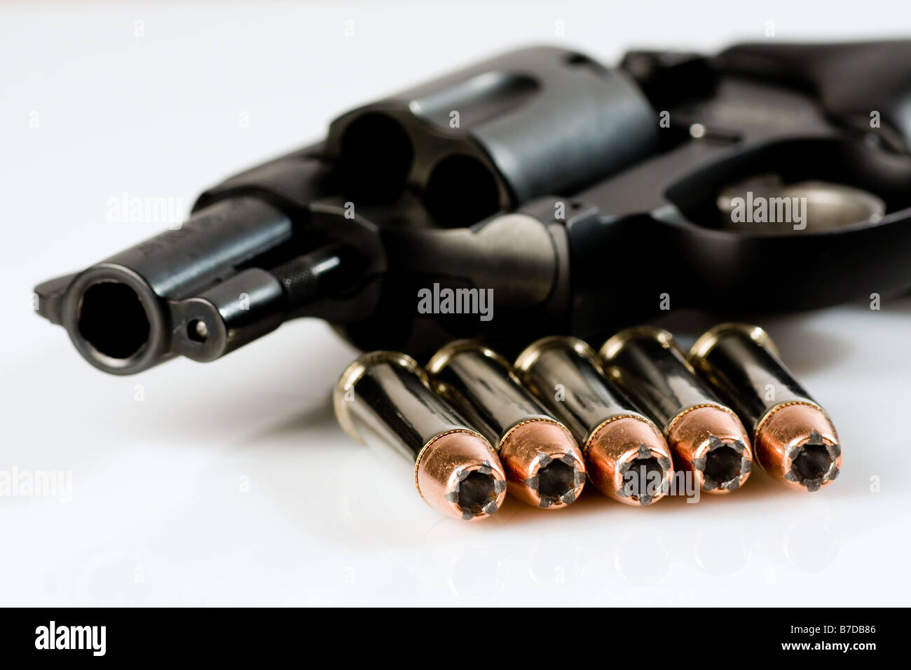 Black Revolver and Bullets Stock Photo