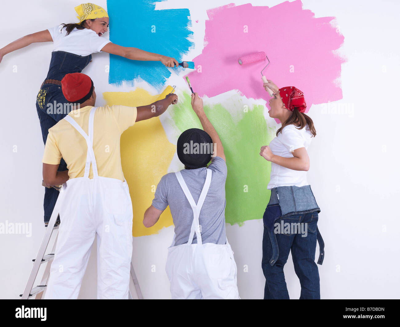 Group of friends painting wall Stock Photo Alamy