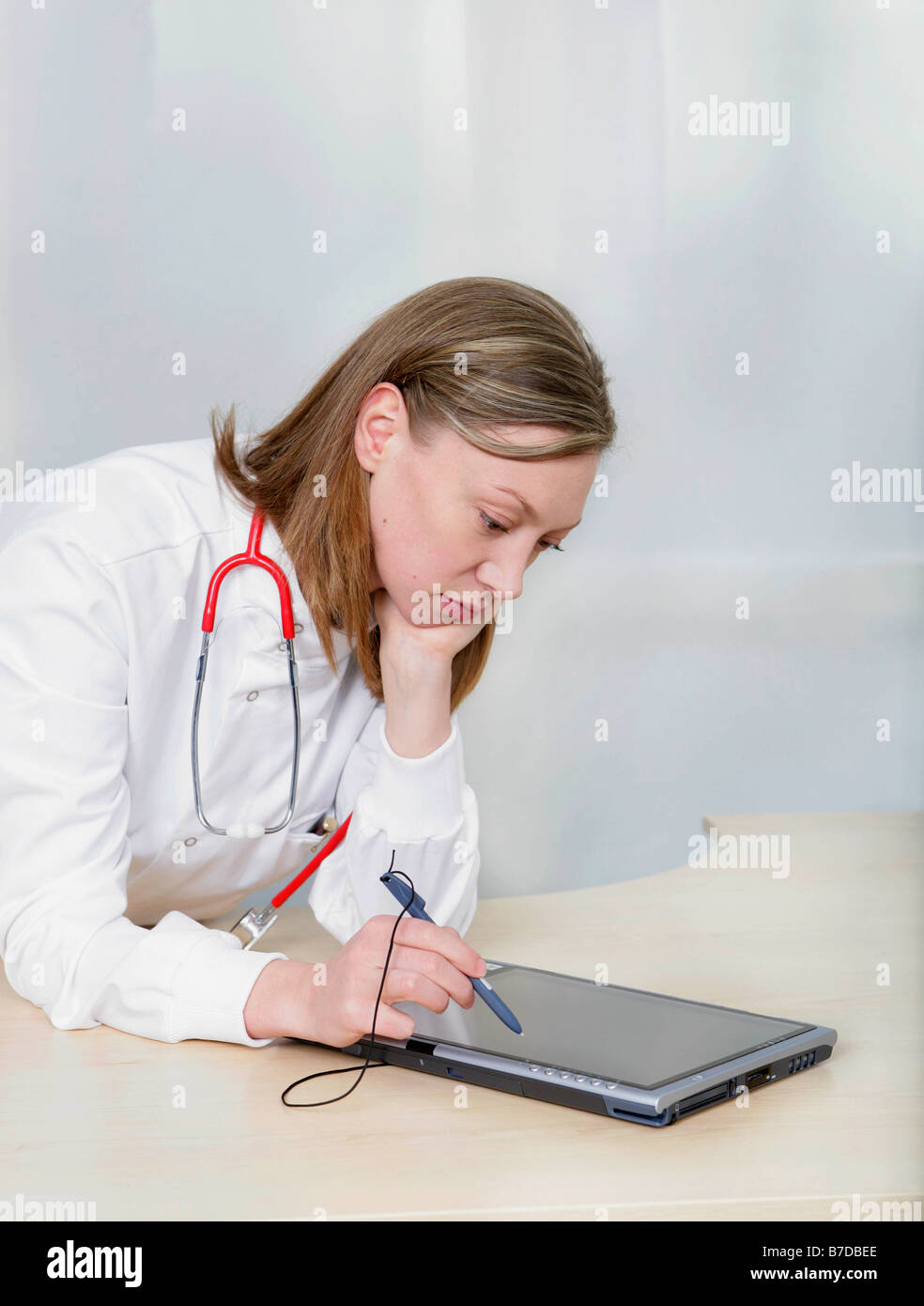 Female doctor using tablet pc Stock Photo