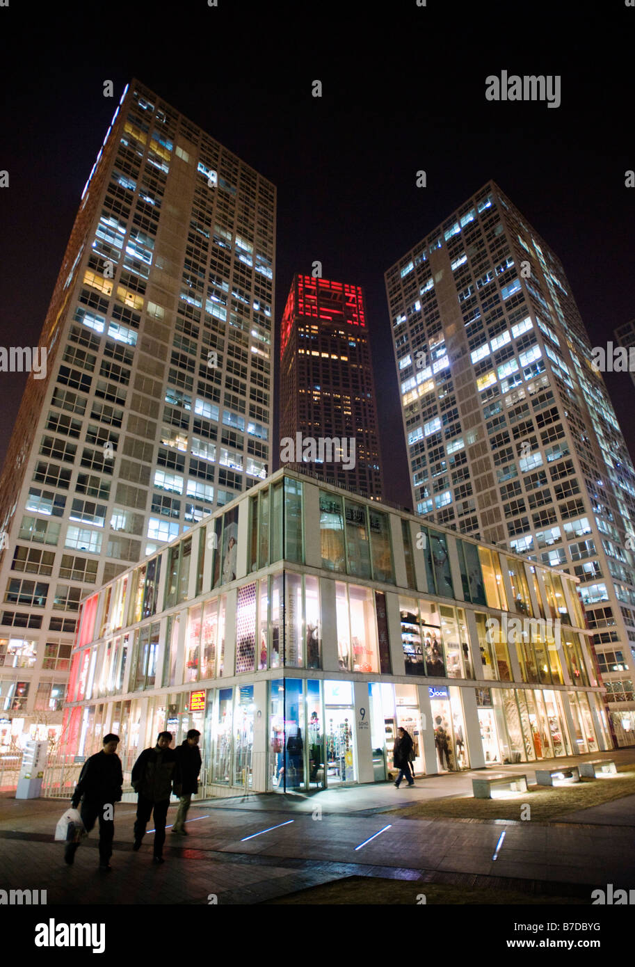 Night view of shops and highrise offices and apartments in new SoHo development in Cebtral Business District CBD of Beijing 2009 Stock Photo