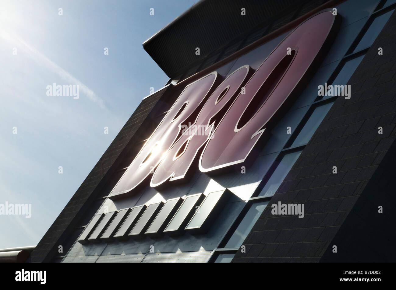 A giant B&Q sign on the outside of a mega DIY store in a retail park at Doncaster Yorkshire Stock Photo
