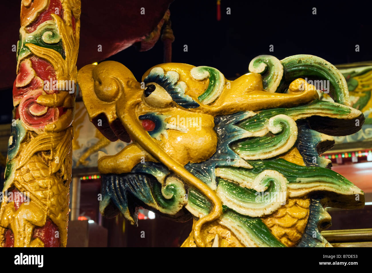 colourful dragon's head carved in wood Stock Photo Alamy