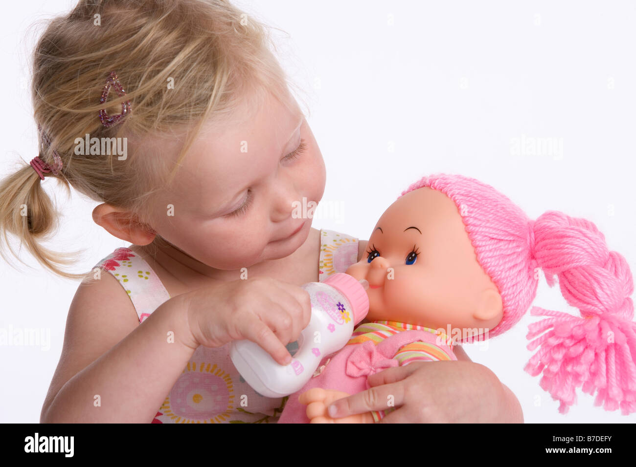 feeding doll baby
