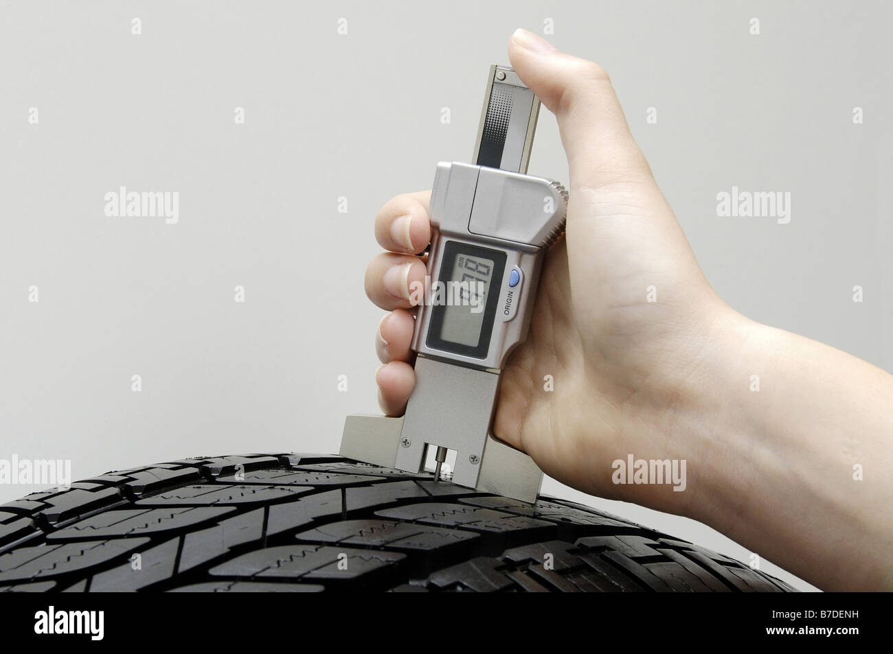 measuring air pressure of a car tire Stock Photo