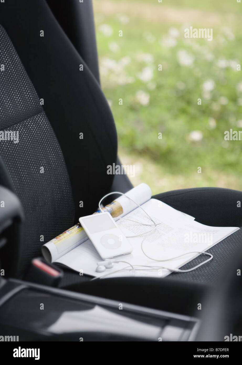 Digital music player on the book Stock Photo Alamy