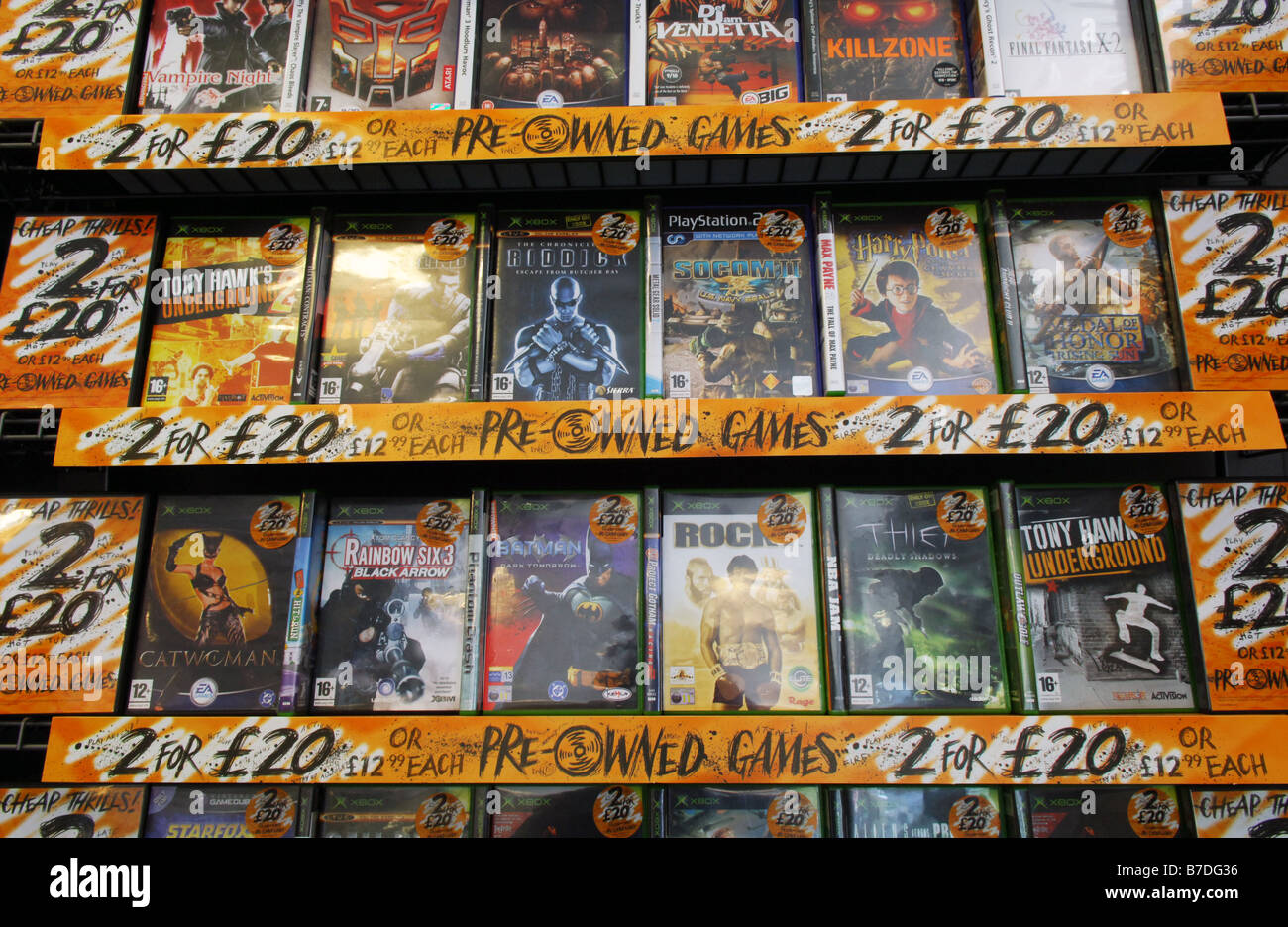Pre-owned computer games for sale, two for twenty pounds in Game Station. Stock Photo