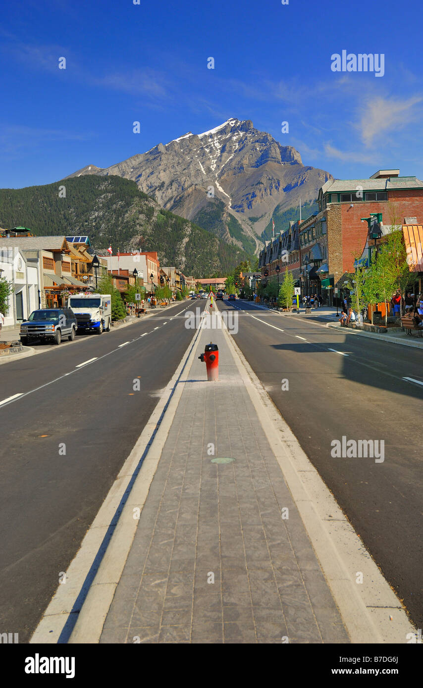 Banff Avenue in the very popular town of Banff, in Alberta, Canada. This the main shopping area. Vertical format Stock Photo
