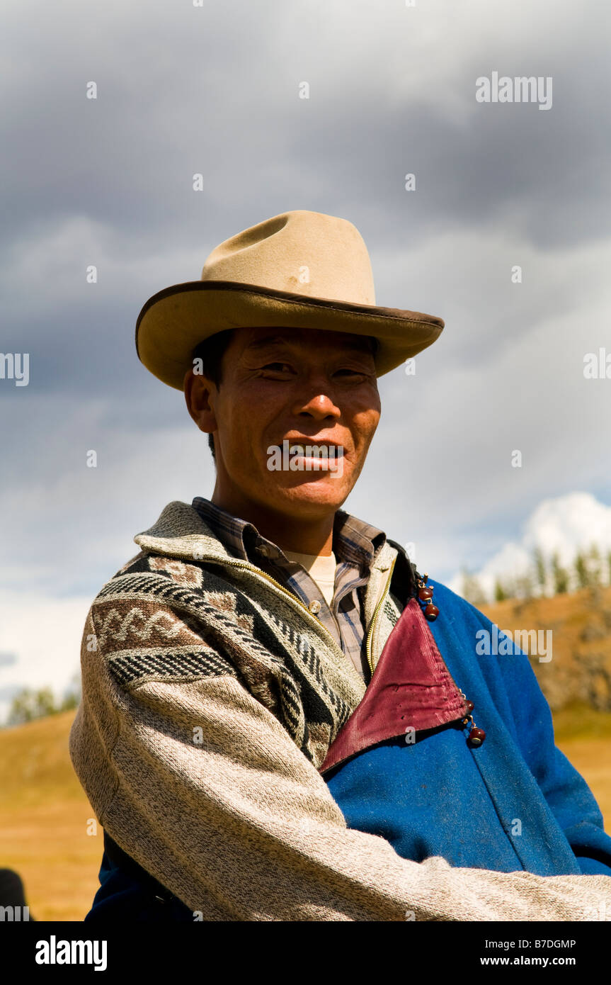 Portrait of a Mongolian nomad riding his horse Stock Photo - Alamy