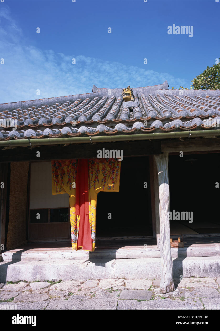Traditional Okinawa house and clothes Stock Photo Alamy