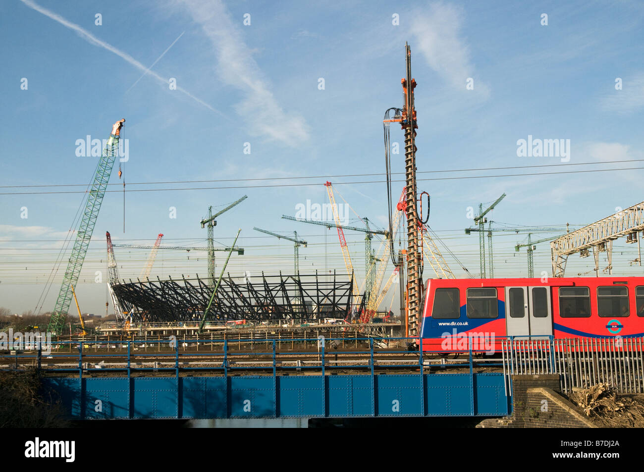 UK London DLR train with Olympic Sadium construction in background in ...