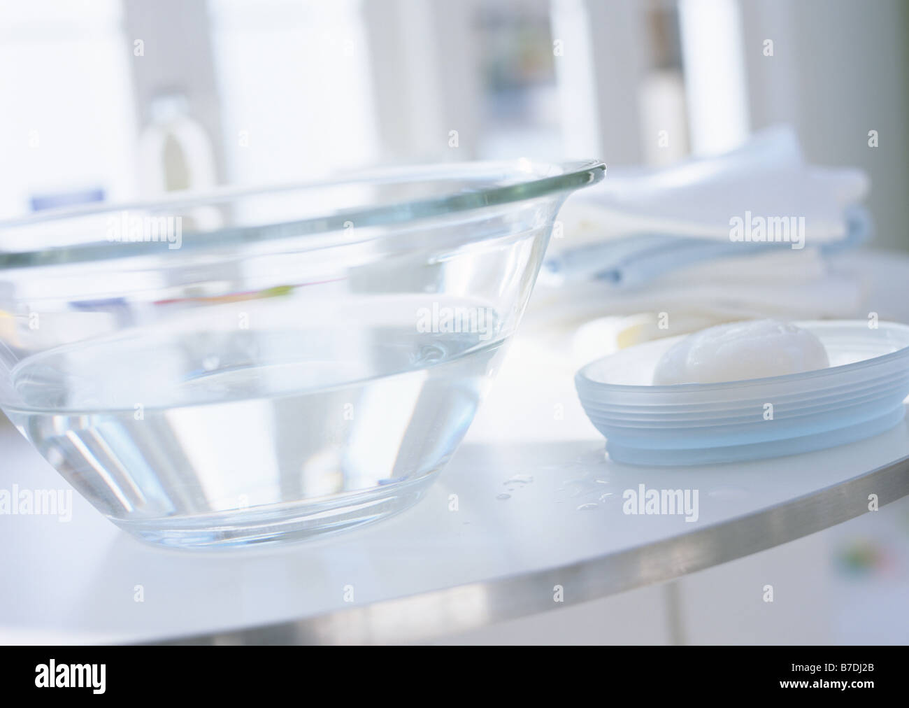 Glass wash bowl and soap Stock Photo Alamy
