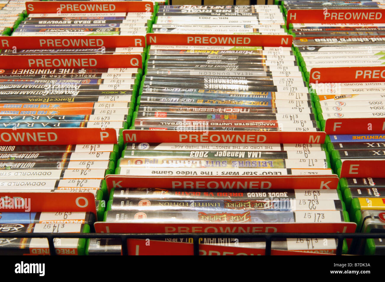 Pre-owned computer games for sale, in Game filed alphabetically. Stock Photo