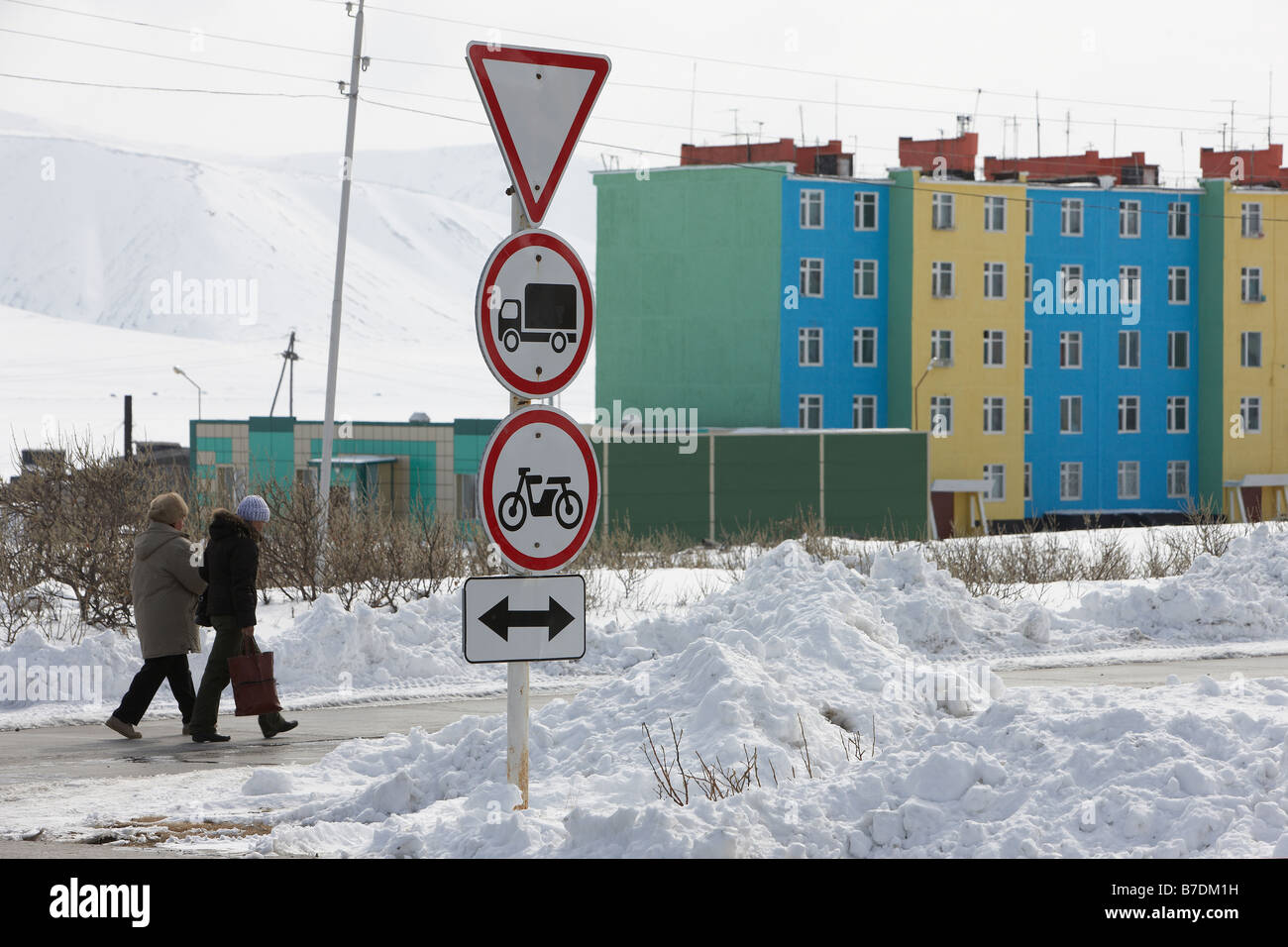 People walking in Amguema, Chukotka,  Siberia Russia Stock Photo
