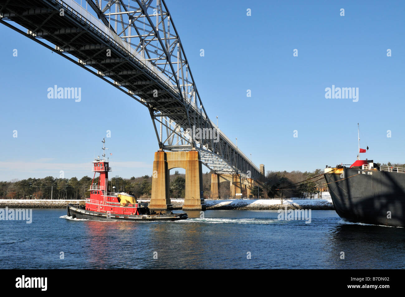 Tugboat pulling double hulled fuel oil barge in the Cape Cod Canal